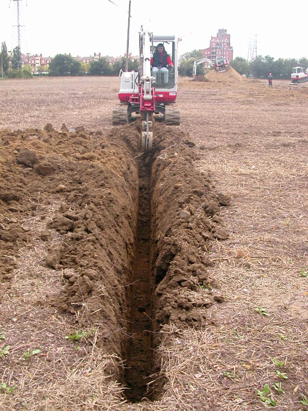 Takeuchi con benna a farfalla...