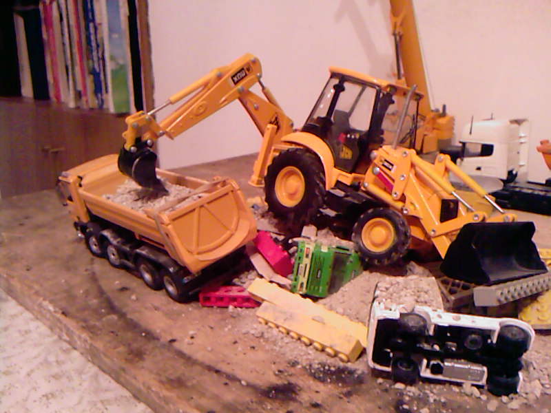 terna jcb scarica macerie su actros mb