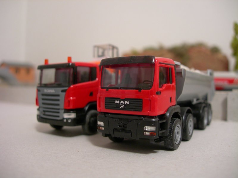 Scania R420 e MAN TGA