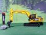 komatsu LC 215 hybrid con martellone