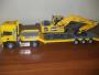 Pianale con carico Komatsu HB215 Hybrid