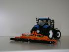 New Holland T 7060 con erpice rotante dietro