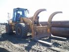 Cat 962g con pinza