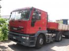 Iveco 440E42 con semirimorchio trasporto ferro