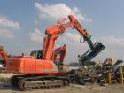 Fiat Kobelco E235 con frantumatore