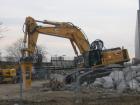 Liebherr 974 con martellone