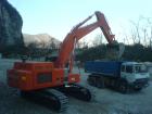 Hitachi ZX520 e Iveco 330-30