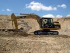 CAT 318 C N Ike al lavoro