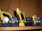 newholland e215 cat 330d komatsu pc210