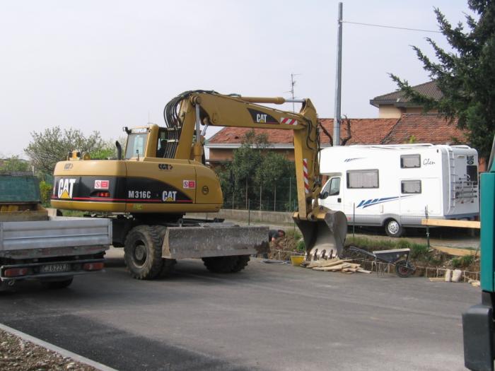 Caterpillar M316C al lavoro