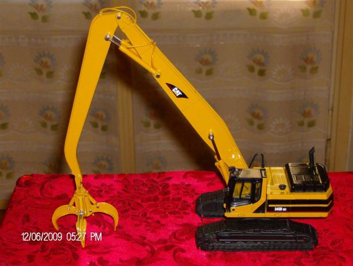 CAT 345BL CON POLIPO ROTTAME