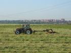 new holland M135 e falciatrice vicon ( piane campo di merlo)